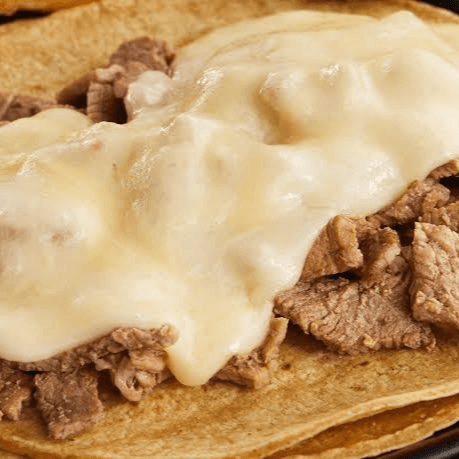 Taco de Bistec de Res con Queso.