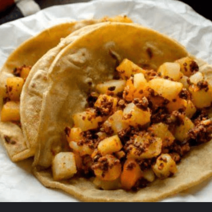 Taco Guisado /Papas con Longaniza
