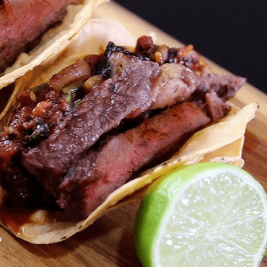 Taco de Sirloin Asado al Carbón.
