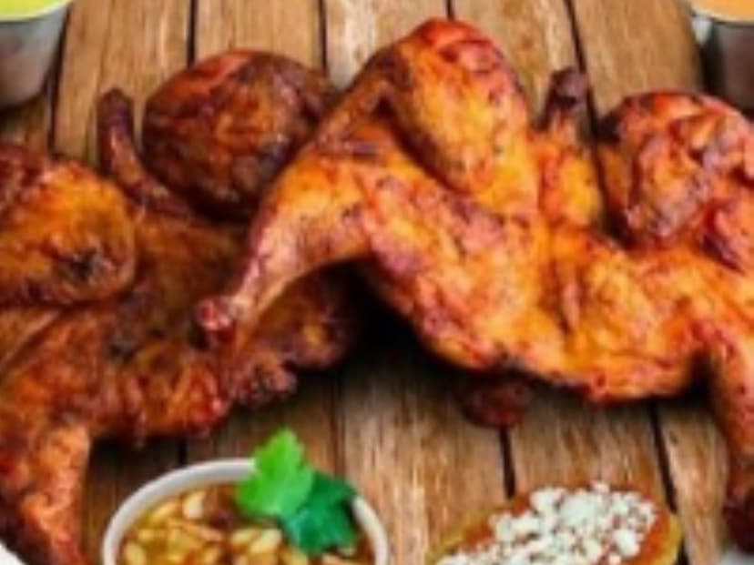 Saborni´s Pollos y Costillas  Ahumadas  (Santiago)