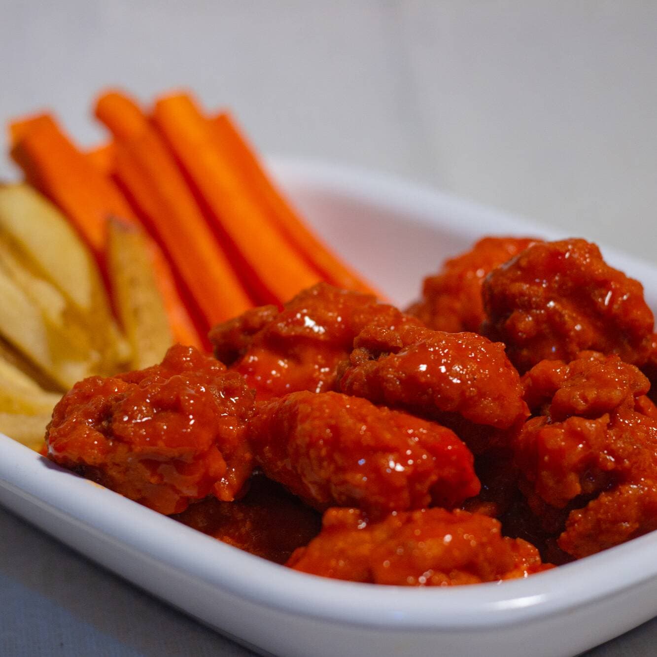1KG DE BONELESS + 2 REFRESCOS (PESO EN CRUDO)