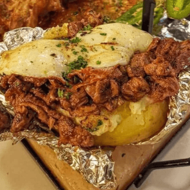 900g de Bistec con Queso + 2 Papas al Horno
