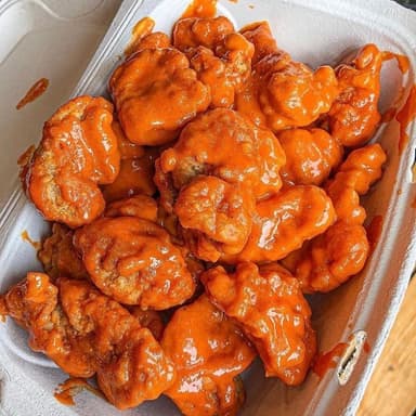 Orden de Boneless 100% Pechuga de Pollo y Papas