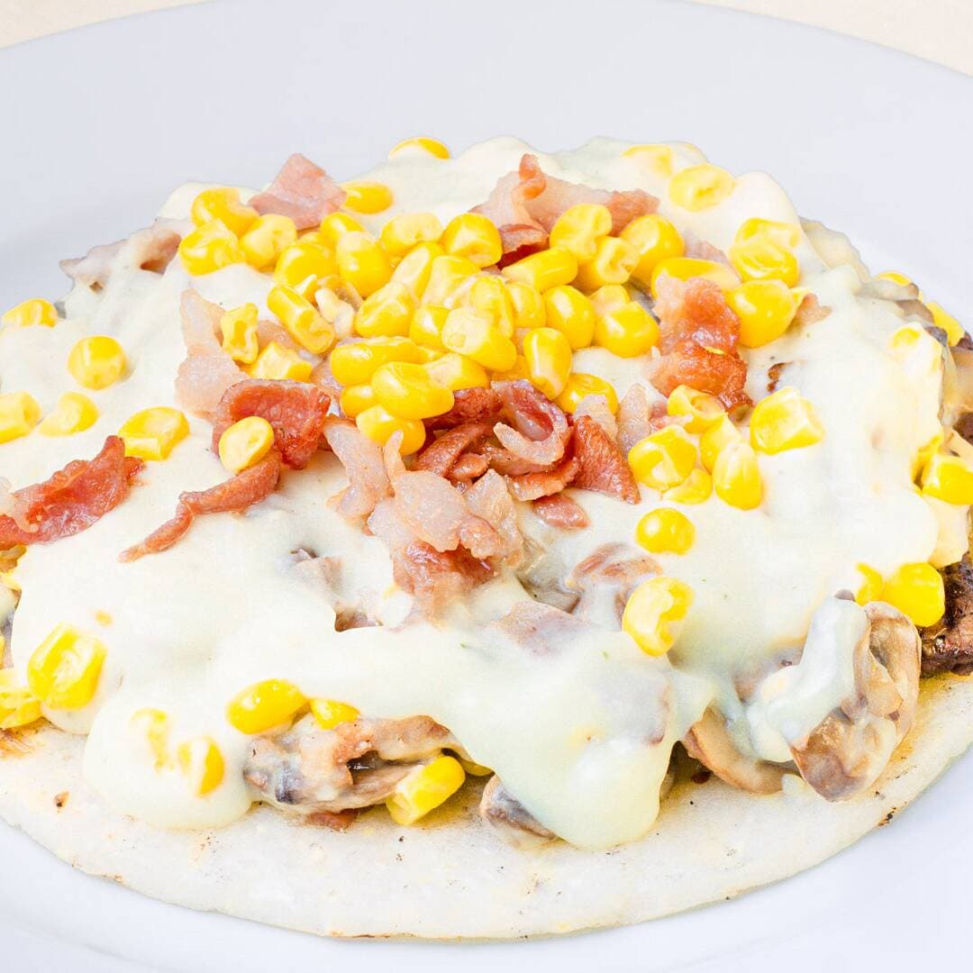 Res con Champiñones
