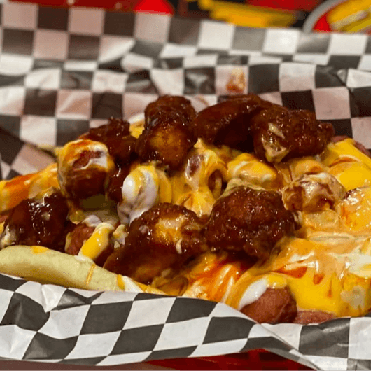 Combo Salchipapas + Boneless.