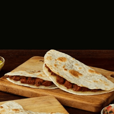 Quesadilla de Harina con Chicharrón en Salsa Verde