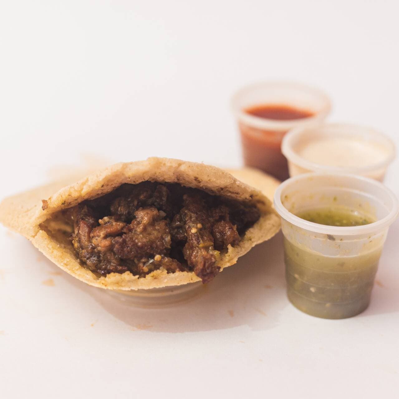 Gordita de Chicharrón en Salsa Verde