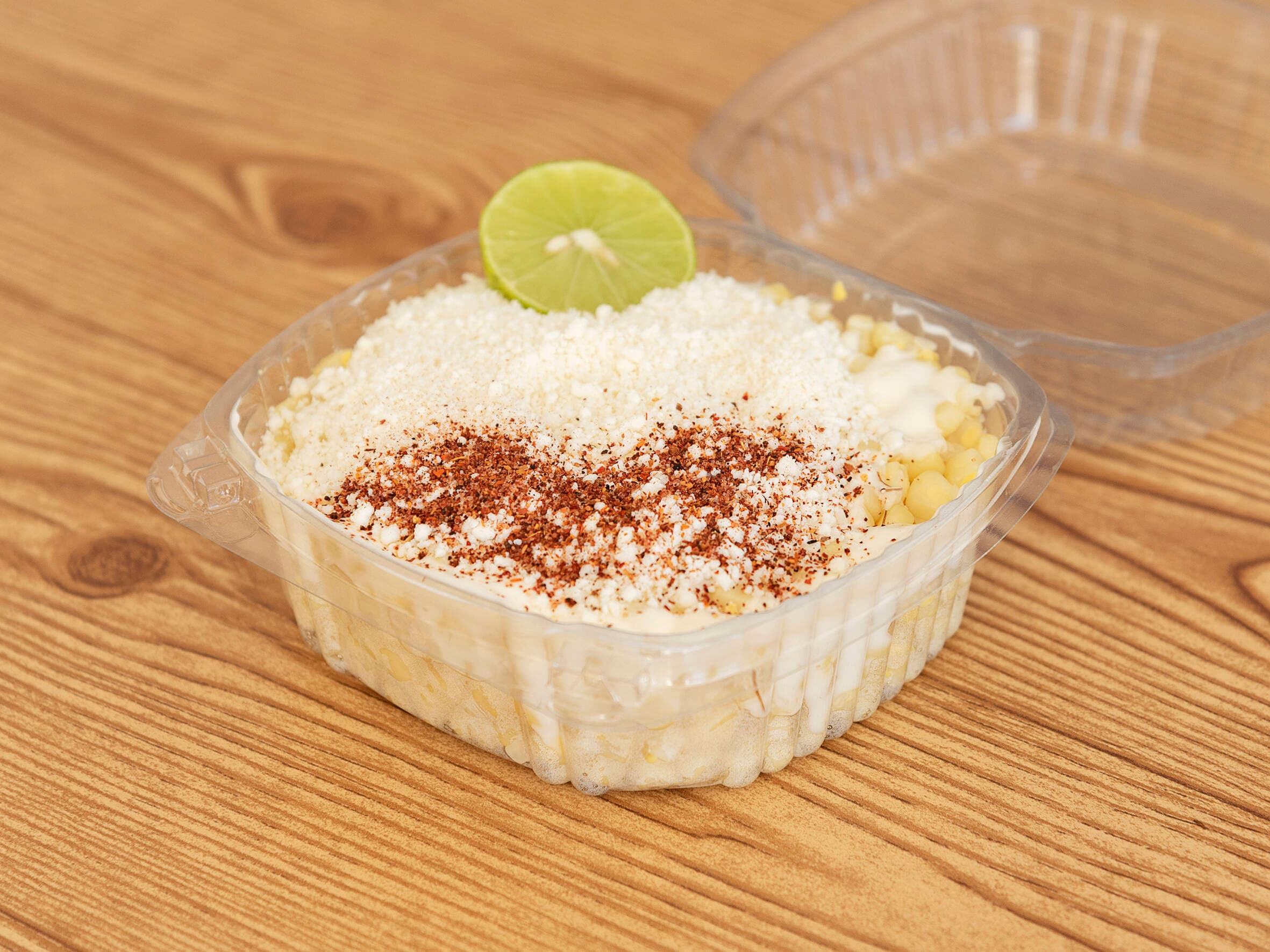 1/2 Elote con crema y queso