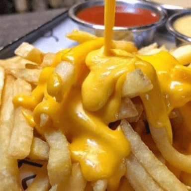 PAPAS FRITAS CON QUESO