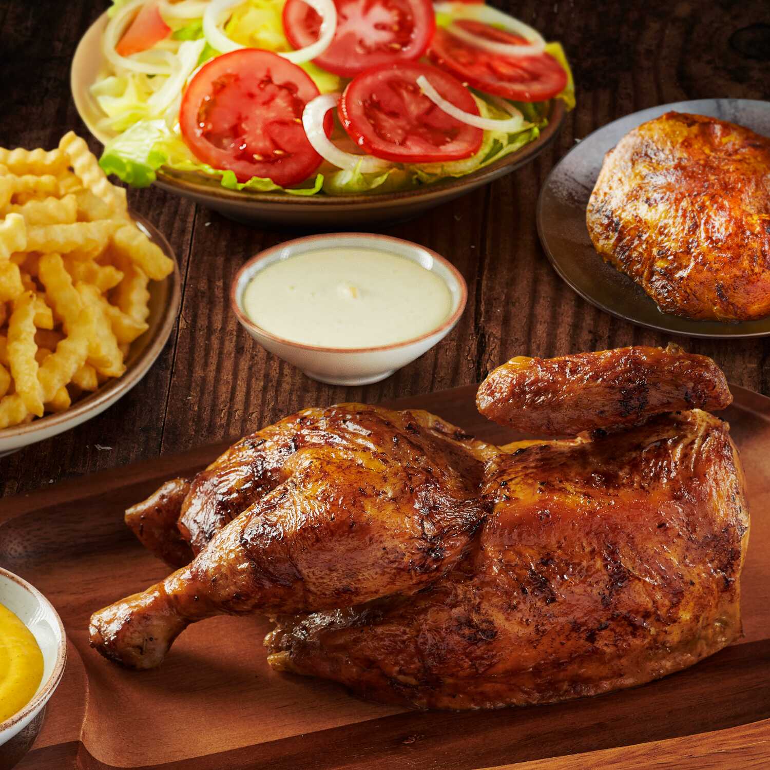 1/2 pollo con papas y ensalada + 1/4 GRATIS