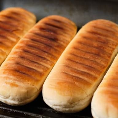 4 Perros Planchas ( Jamón, Salchicha, Mozarella)