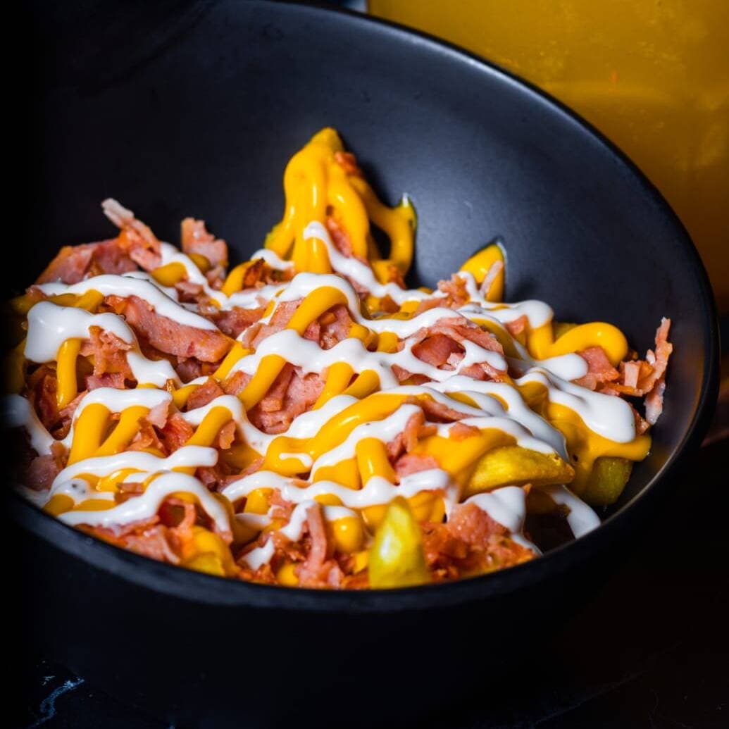 Papas Queso y Tocino