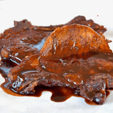 Chuleta de Cerdo en Salsa de la Casa
