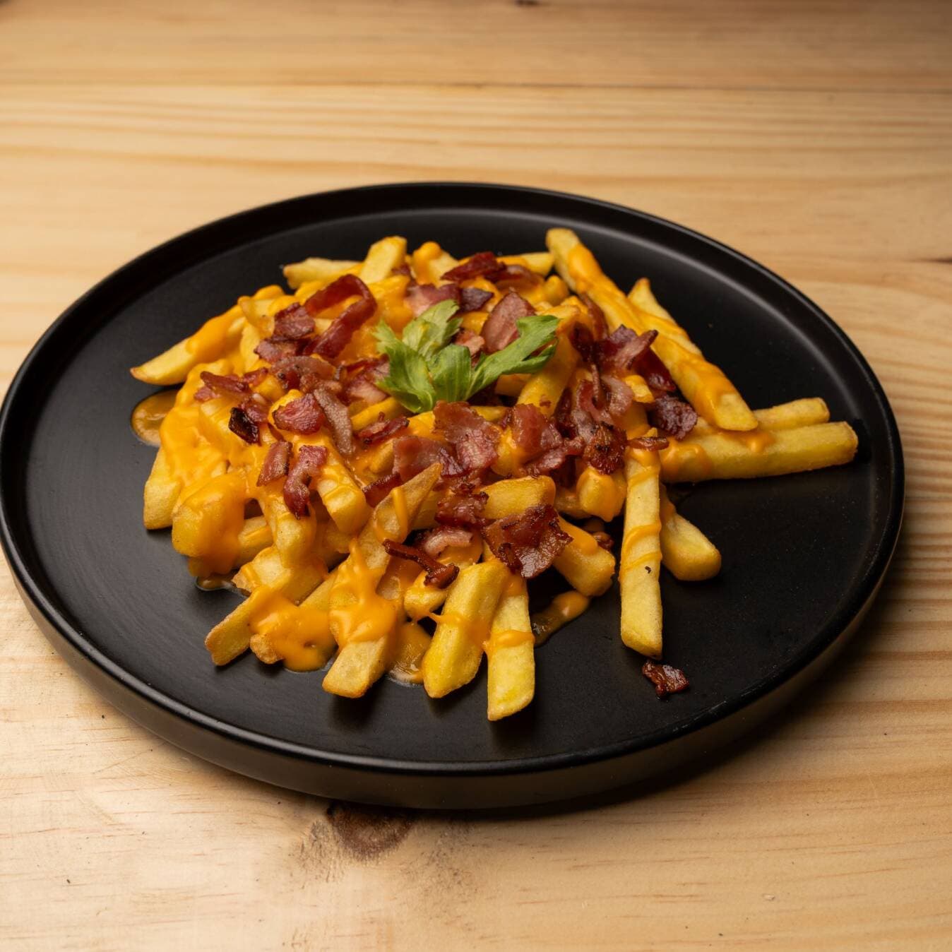 Papas Queso y Tocineta