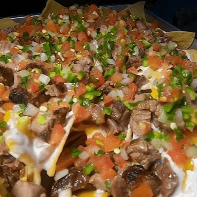 NACHOS CON SIRLOIN