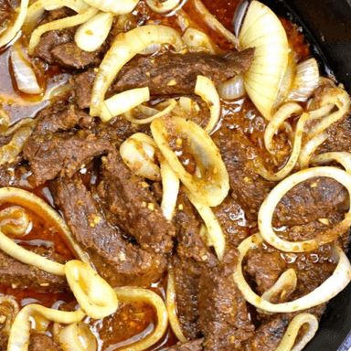 Bistec Encebollado