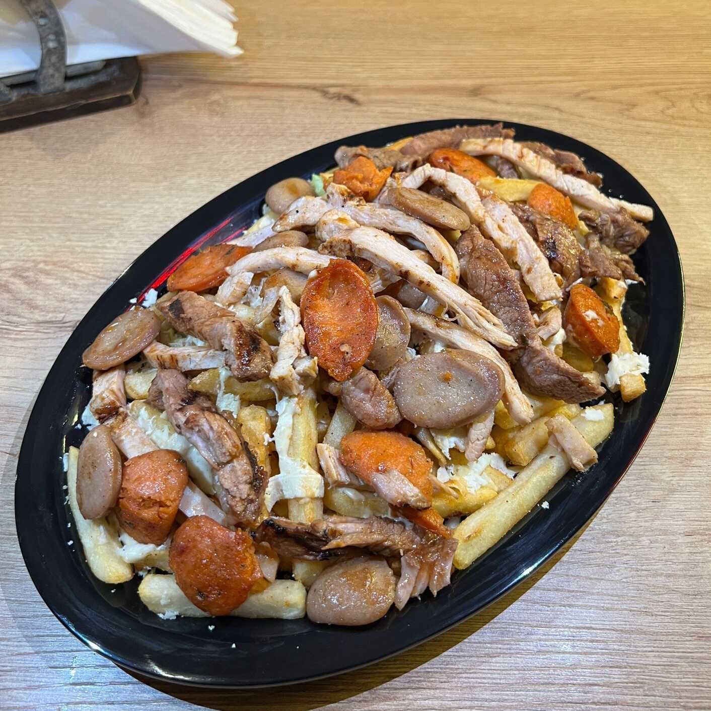 salchipapa cuatro carnes Copiar