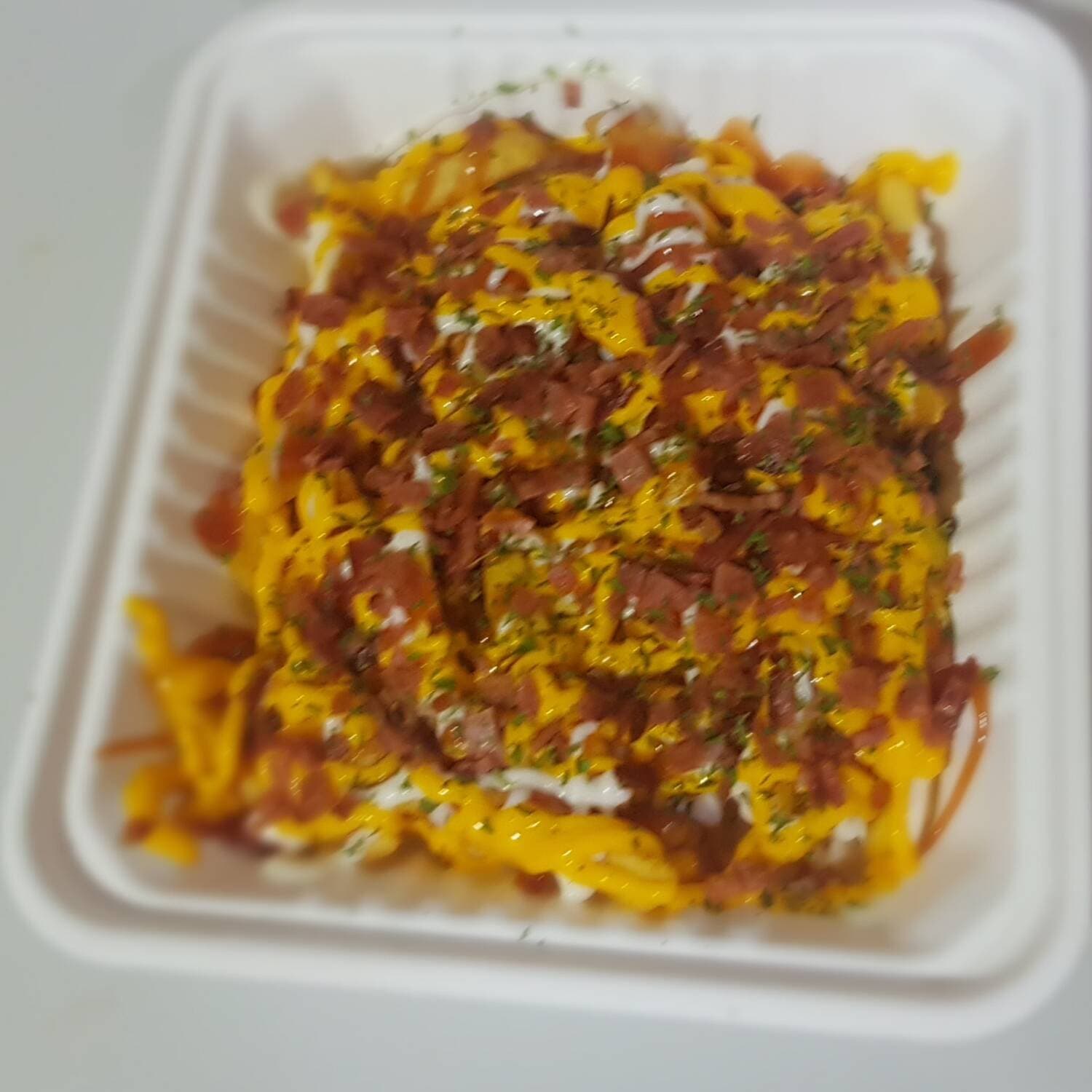 Papas con Tocineta + Te Frio