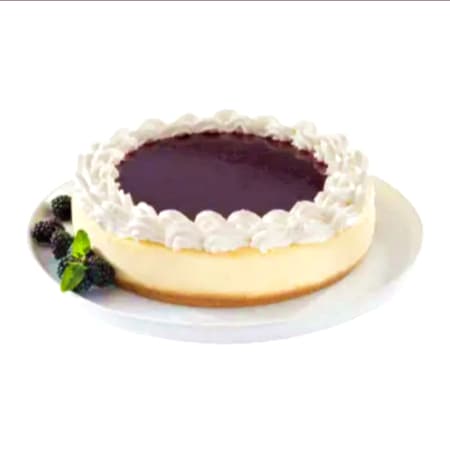 REBANADA DE PASTEL DE QUESO Y ZARZAMORA