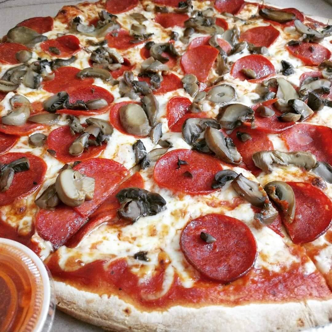 2 Pizzas Grandes de Especialidad