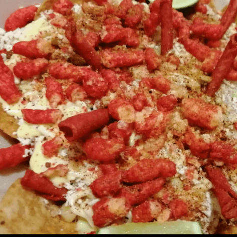 Tostiesquites Bañados de Cheetos Flamín Hot