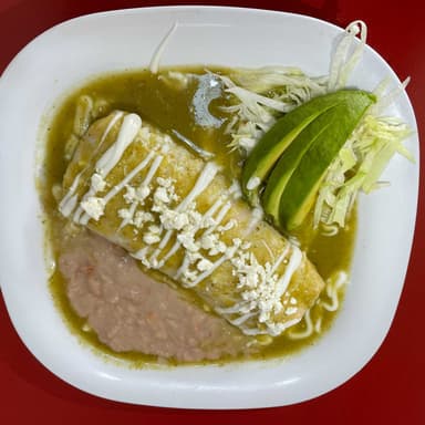 Burritos con Bistec Encebollado, Bañados en Salsa