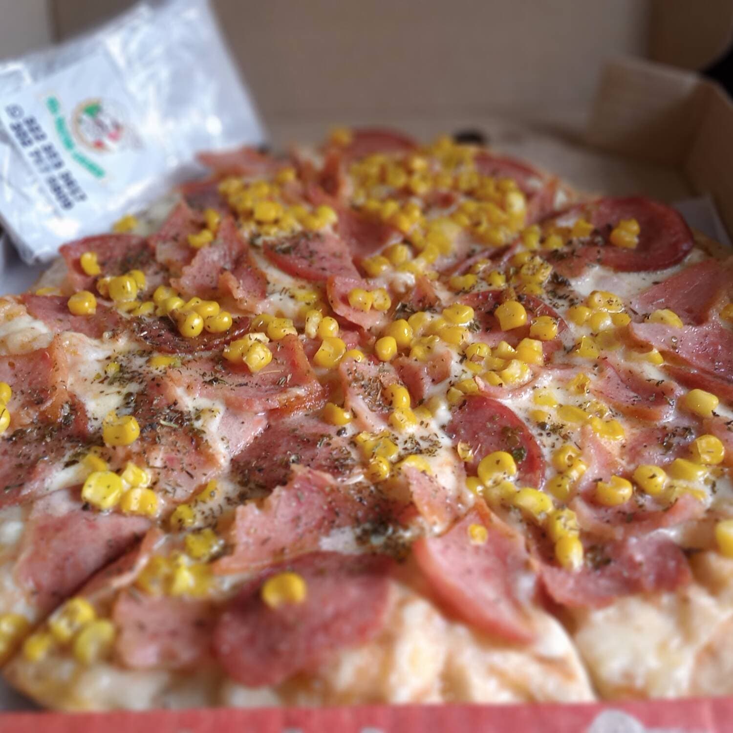 pizza tocineta y maiz