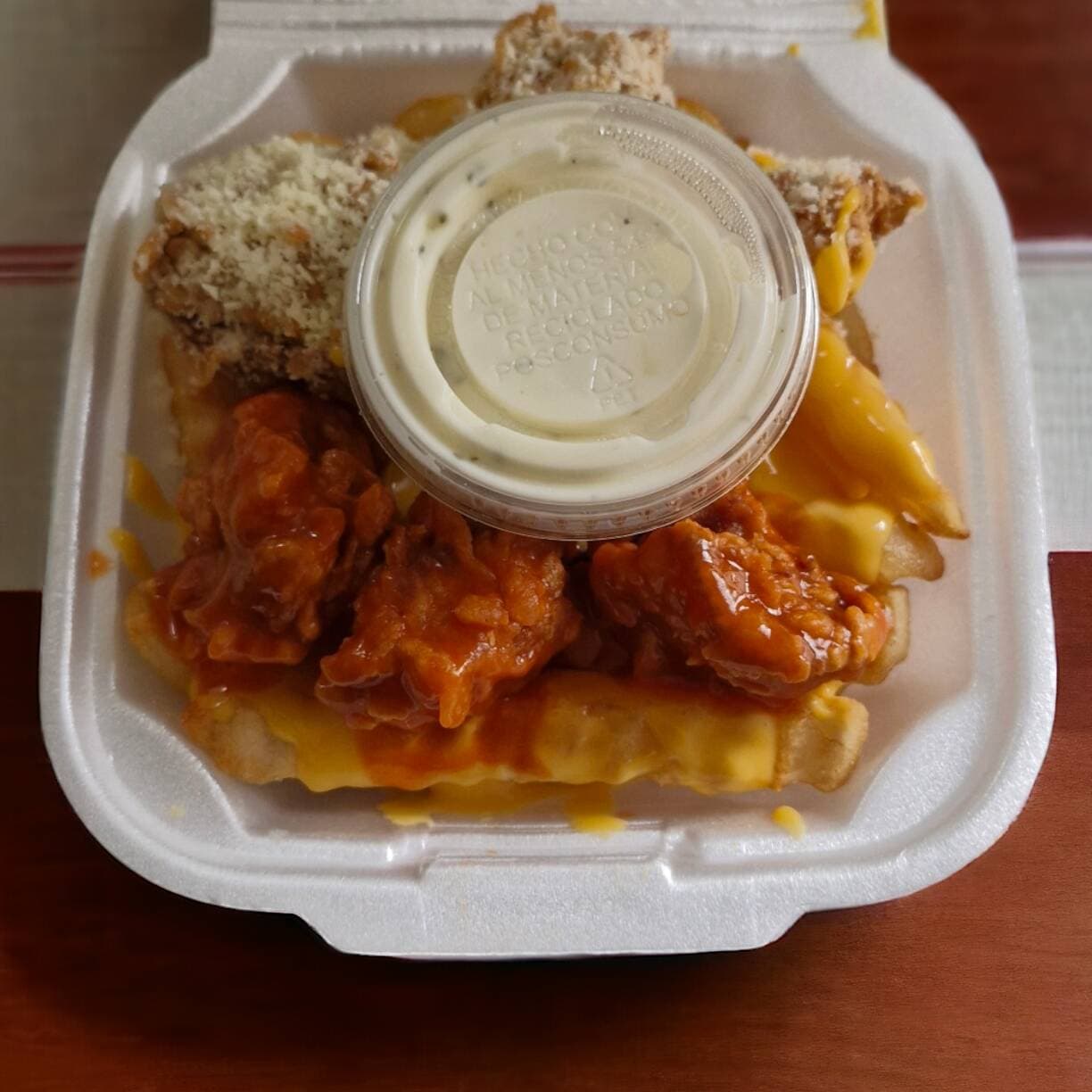 Orden de Papas y 5 Boneless.
