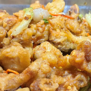 POLLO EMPANIZADO ENCHILADO