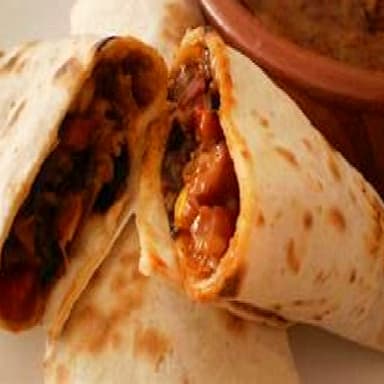 BURRITO DE PUERQUITO EN SALSA ROJA