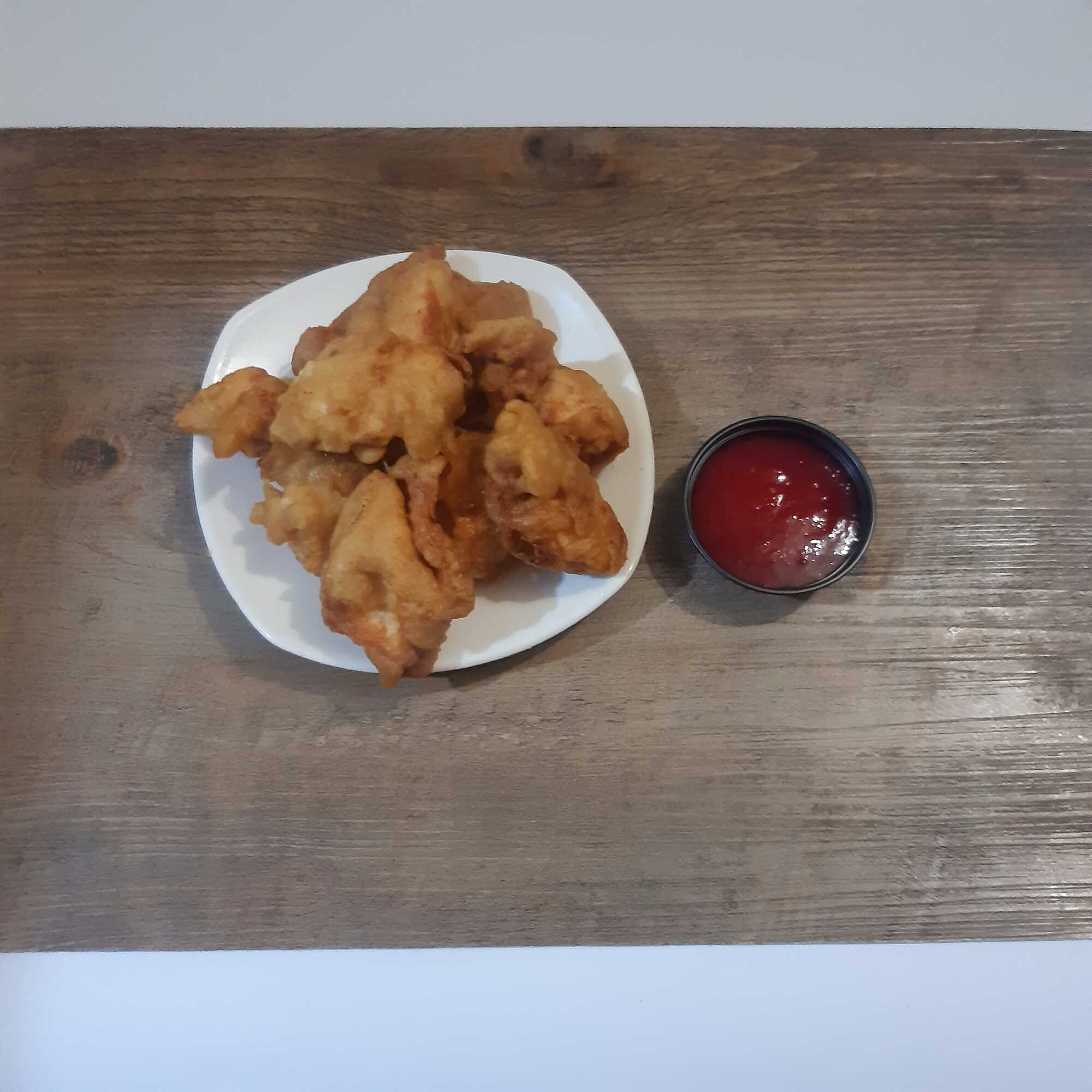 Porcion de Nuggets de Pollo 12 Unidades