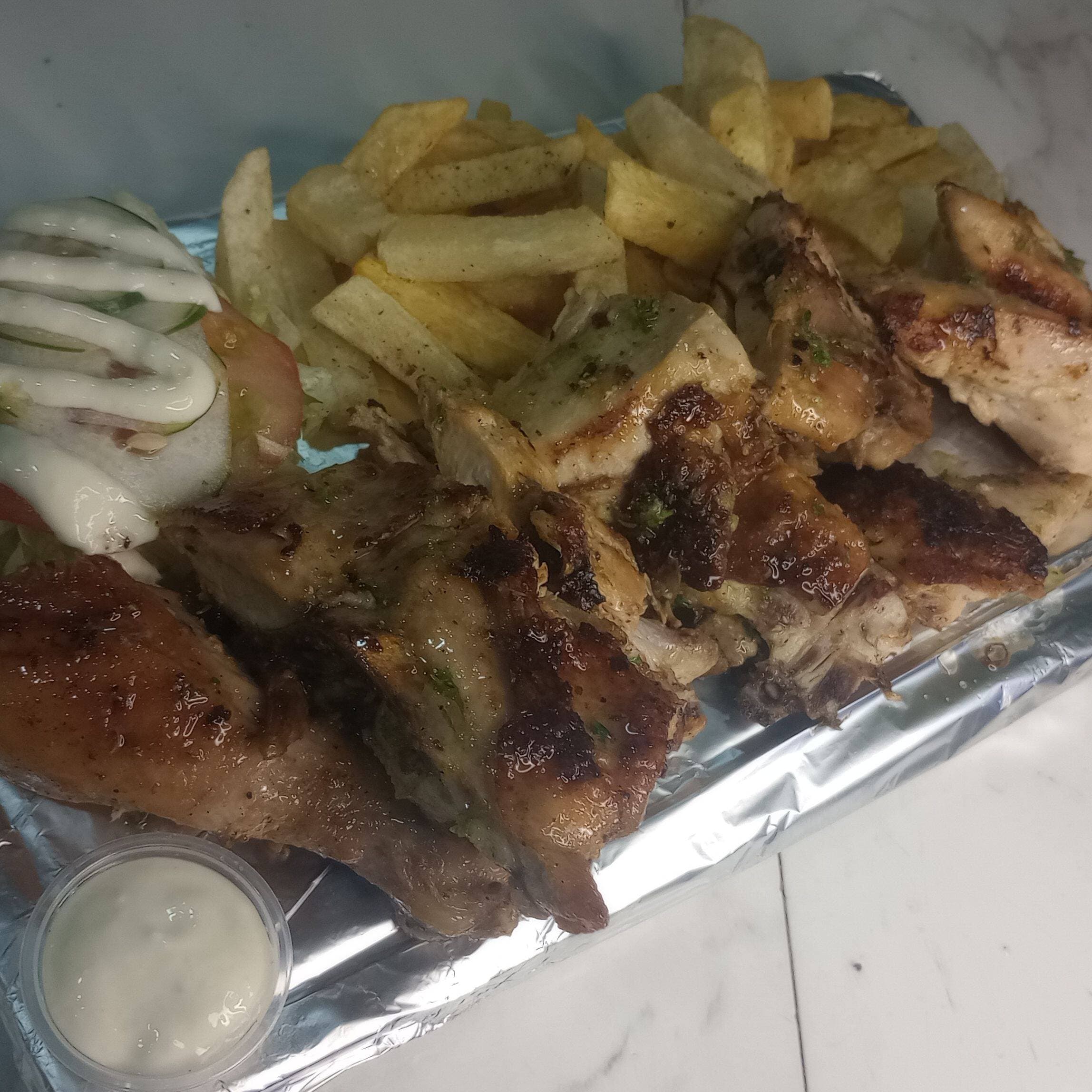 Medio Pollo Asado Al Carbon mas Gaseosa Litro