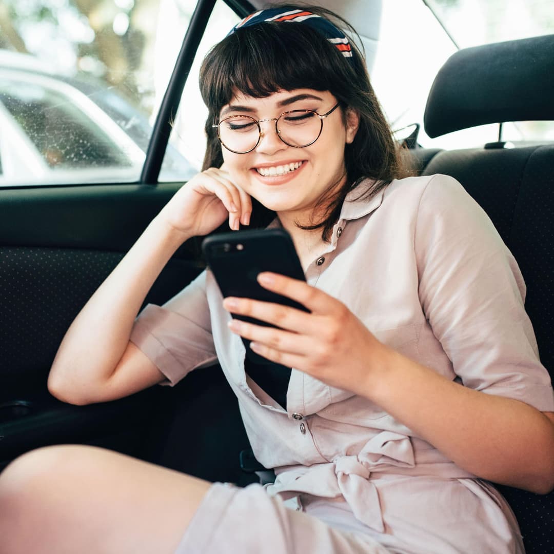 DiDi Pasajera al teléfono